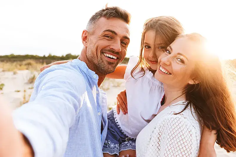 Family with happy, bright smile
